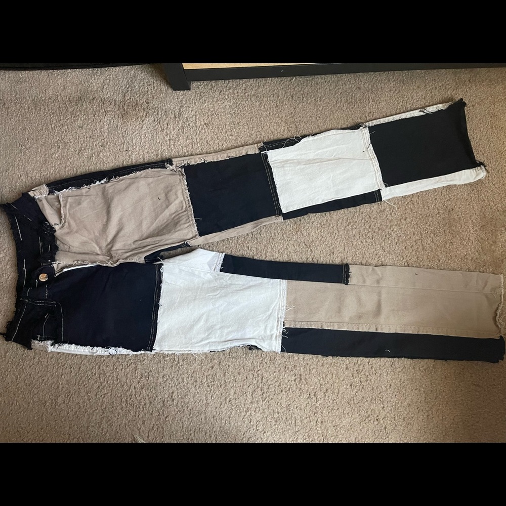 Frayed patch work jeans